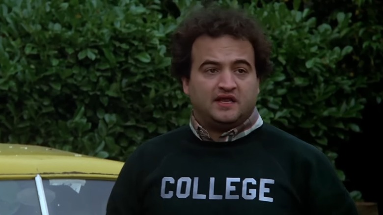 John Belushi as Bluto in his iconic COLLEGE sweater, in Animal House