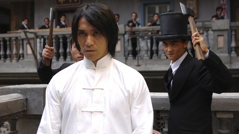 Sing (Stephen Chow) is menaced by two axe-wielding gangsters in Kung Fu Hustle