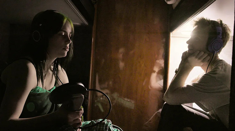 Billie Eilish in recording booth with Finneas in Billie Eilish: The World's a Little Blurry