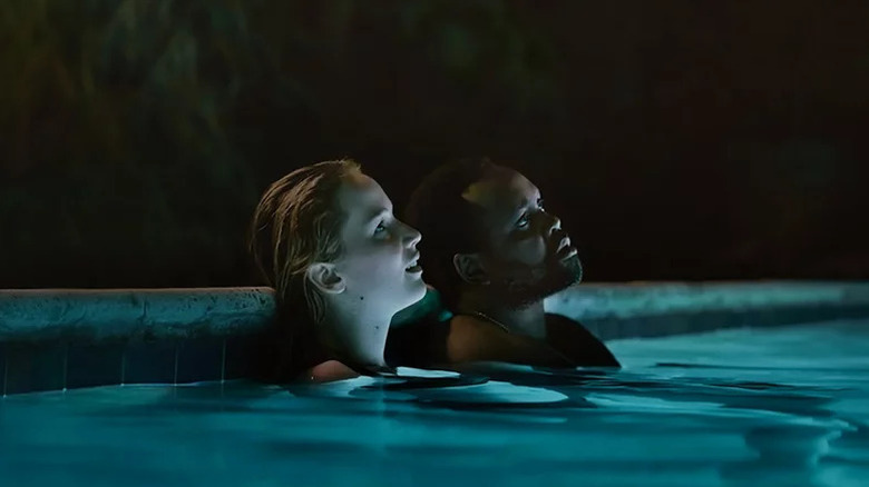 Jennifer Lawrence next to Brian Tyree Henry in pool in Causeway