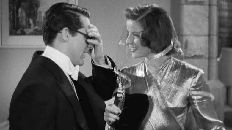 Cary Grant as Dr. David Huxley getting fed up with Katharine Hepburn as Susan Vance in Bringing Up Baby.