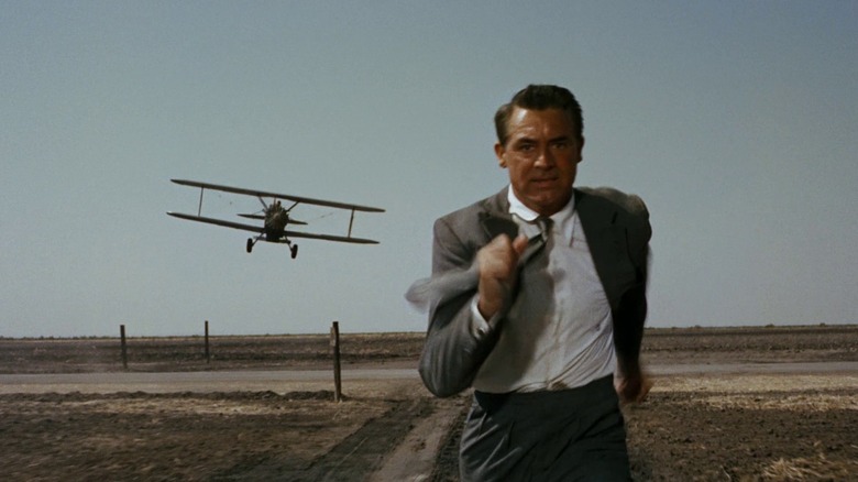 Cary Grant as Roger Thornhill outrunning a plane chasing him down in North by Northwest.