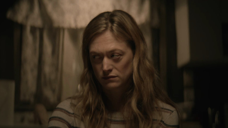 Louise (Marin Ireland) looking to her right in The Dark and the Wicked