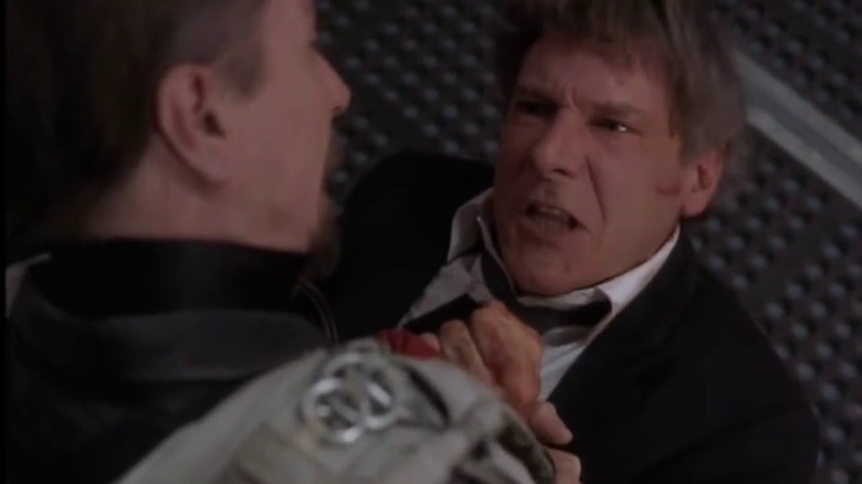 President James Marshall (Harrison Ford) tells Ivan (Gary Oldman) to get off his plane in Air Force One