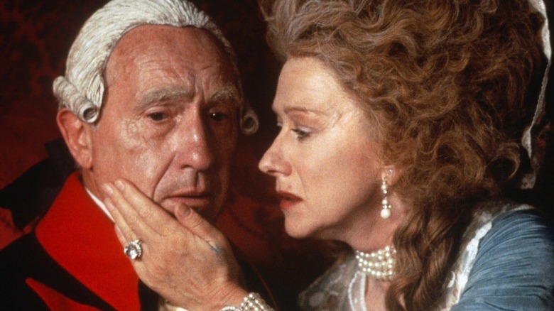 King George (Nigel Hawthorne) is comforted by Queen Charlotte (Helen Mirren) in The Madness of King George