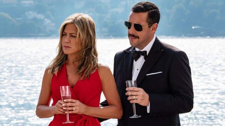 Jennifer Aniston and Adam Sandler as Audrey and Nick, enjoying a cruise in Murder Mystery
