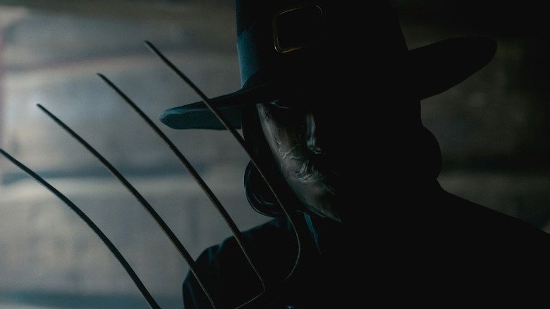 John Carver, threatening people with a pitchfork in Thanksgiving