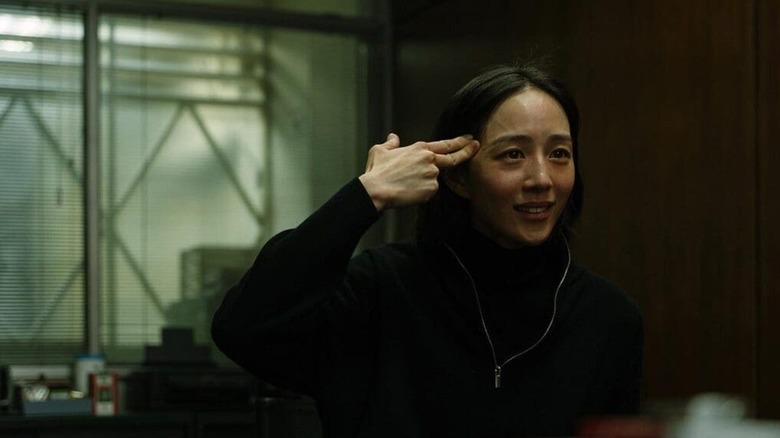 Janine Chang as Wu, breaking down in The Abandoned