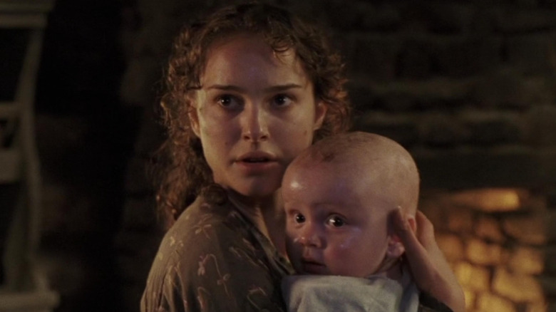 Natalie Portman holds baby