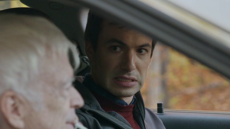 Nathan Fielder watching Bill make a phone call in a car in Nathan For You
