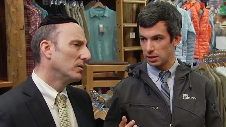 Nathan Fielder wearing a Summit Ice jacket talking to Rabbi Denbo in Nathan For You