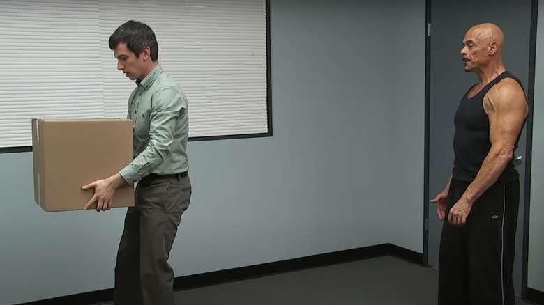 Nathan Fielder showing Jack Garbarino how to move boxes in Nathan For You