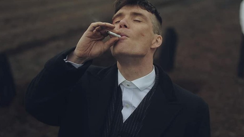 Tommy smokes in Peaky Blinders