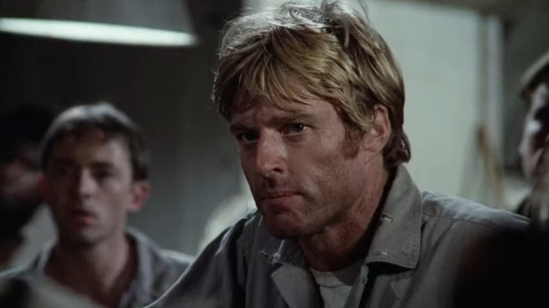 Henry Brubaker (Robert Redford) staring angrily in Brubaker