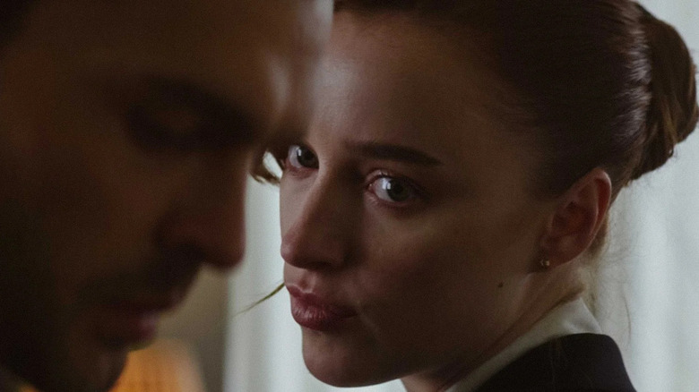 Emily (Phoebe Dynevor) stares after Luke (Alden Ehrenreich) in Fair Play