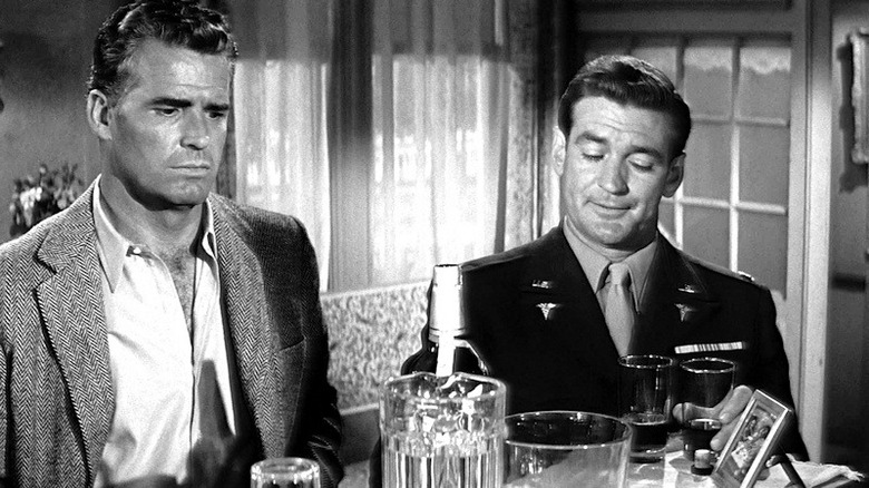 A concerned Jeff Pike (James Garner) has drinks with Walter Gerber (Rod Taylor) in 36 Hours