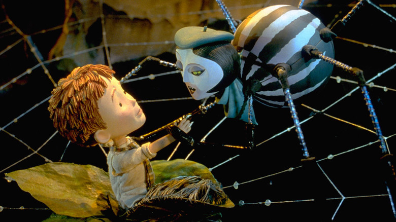 James Trotter (Paul Terry) sits in a web with Miss Spider (Susan Sarandon) in James and the Giant Peach