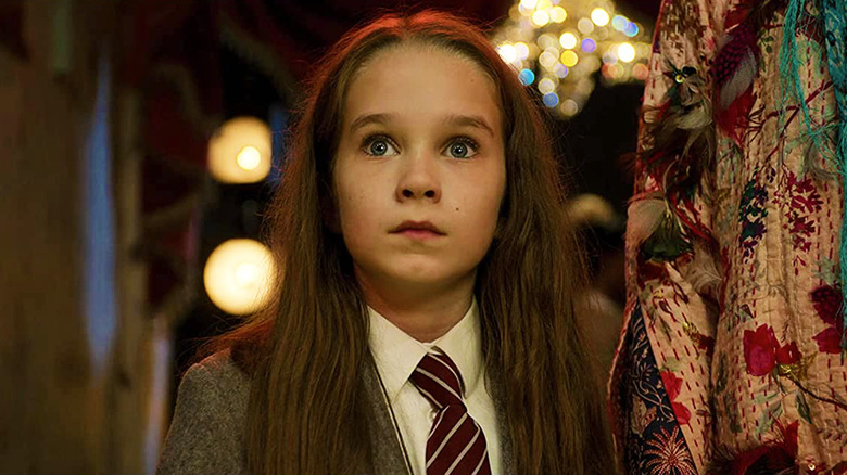 Matilda Wormwood (Alisha Weir) looks up intently in Matilda the Musical