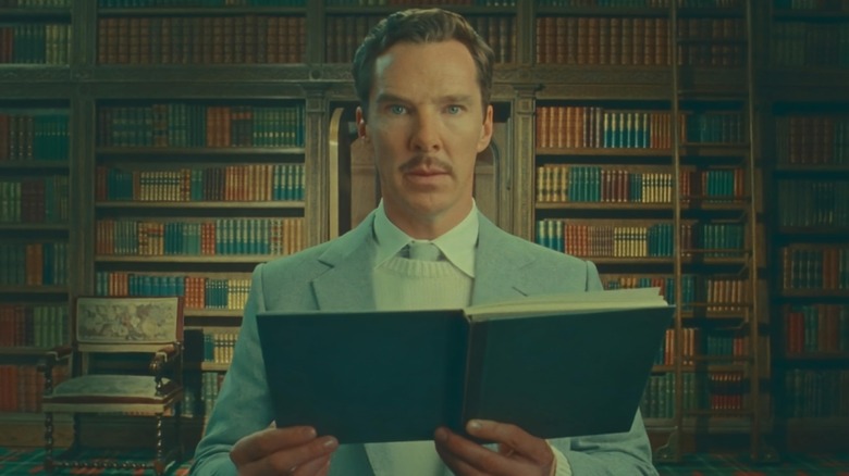 Henry Sugar (Benedict Cumberbatch) looks up from reading a book in a library in The Wonderful Story of Henry Sugar and Three More