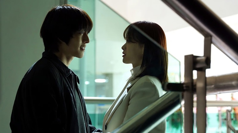 Gwi-ju (Jang Ki-yong) speaks with Do Da-hae (Chun Woo-hee) on a staircase in The Atypical Family