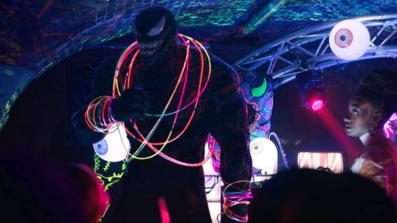Venom partying in a club