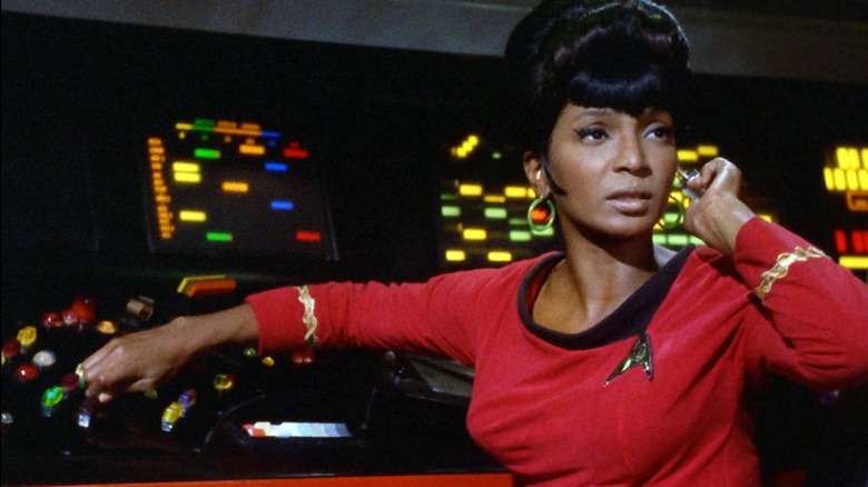 Nichelle Nichols, as Uhuru, masters the comms console in Star Trek the Original Series