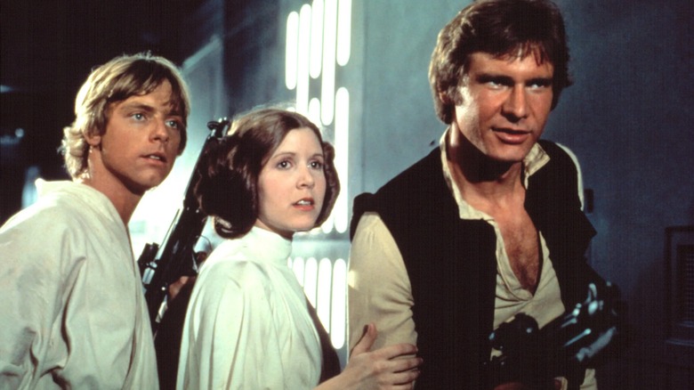 Luke (Mark Hamill) Leia (Carrie Fisher) and Han Solo (Harrison Ford) fight to escape the Death Star in Star Wars A New Hope
