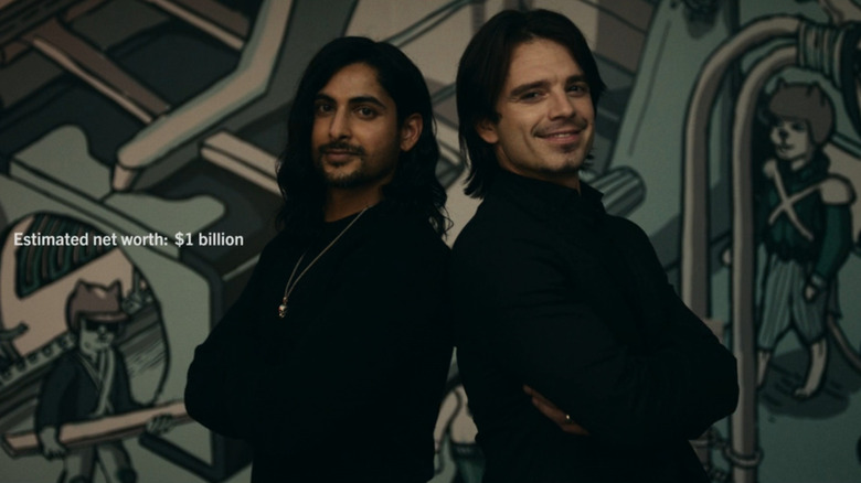 Baiju Bhatt (Rushi Kota) and Vlad Tenev (Sebastian Stan) posing back to back in Dumb Money