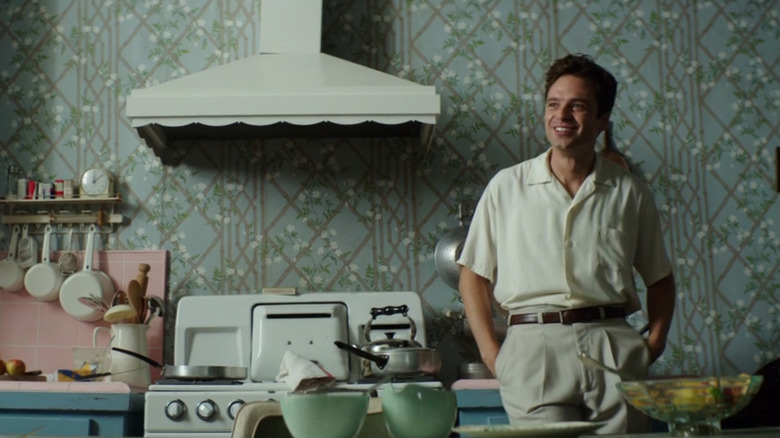 Charles (Sebastian Stan) smiling in kitchen in We Have Always Lived In the Castle