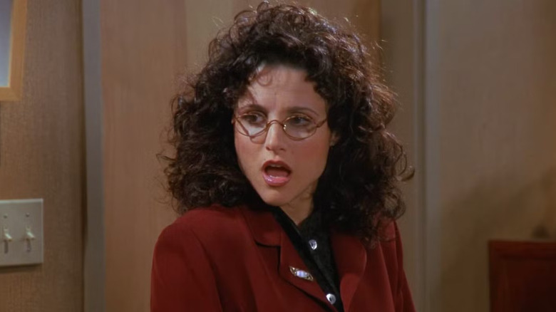 Julia Louise-Dreyfuss as Elaine Benes looks shocked on Seinfeld