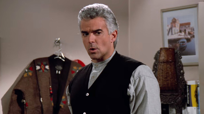 John O'Hurley as J. Peterman looks worried in Seinfeld