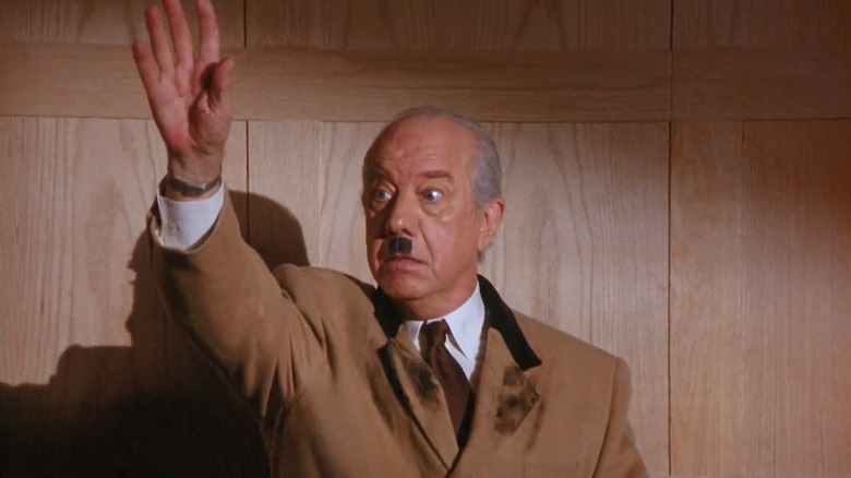 Ian Abercrombie as Mr. Pitt gives the Hitler salute in Seinfeld