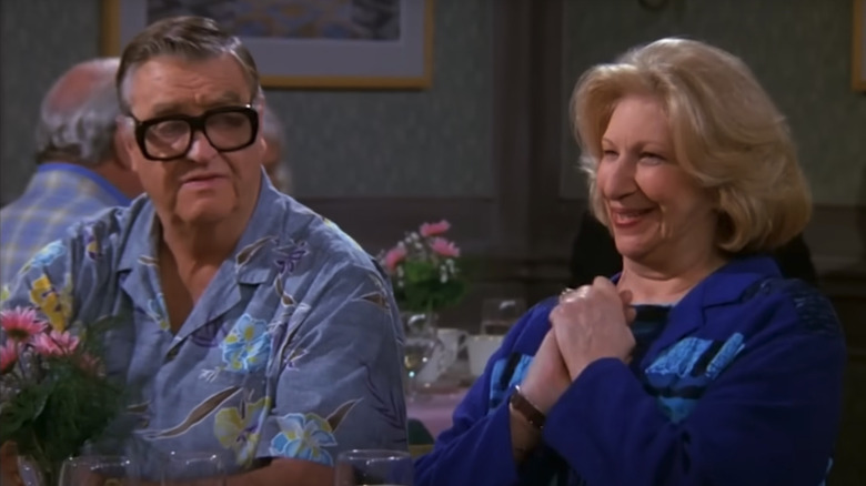 Barney Martin as Morty Seinfeld sits next to Liz Sheridan as Helen Seinfeld in Seinfeld