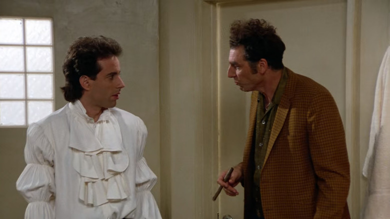 Kramer (Michael Richards) looks at Jerry (Jerry Seinfeld) in his puffy shirt in Seinfeld