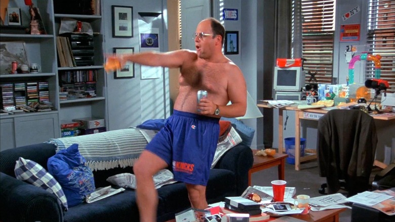 George (Jason Alexander) walks in his apartment shirtless in Seinfeld