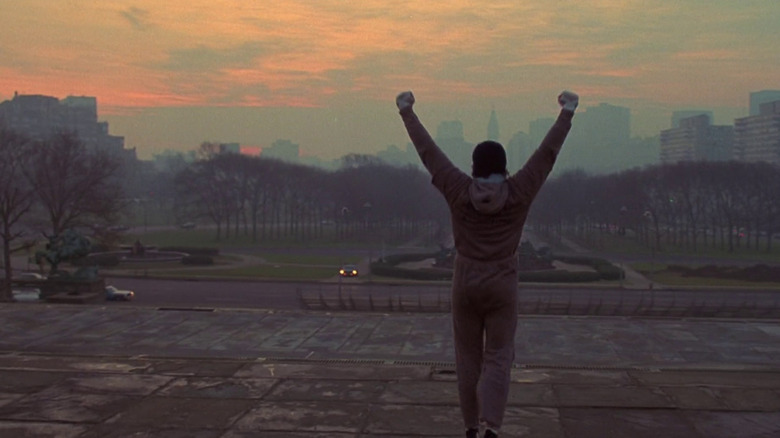 Sylvester Stallone as Rocky, standing tall in Rocky