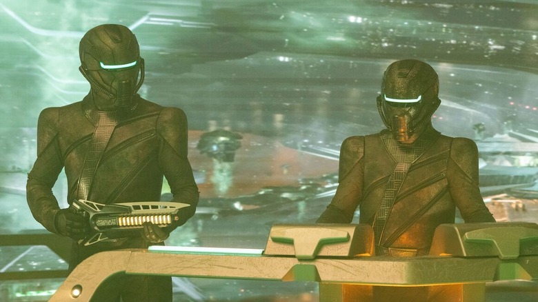 Two Breen stand by a console in Star Trek: Discovery
