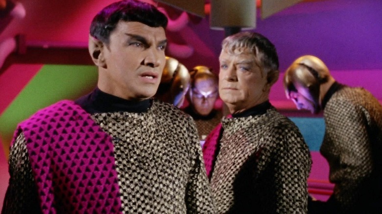 The Romulan Commander (Mark Lenard) speaks to the Romulan Centurion (John Warburton) in Star Trek: The Original Series