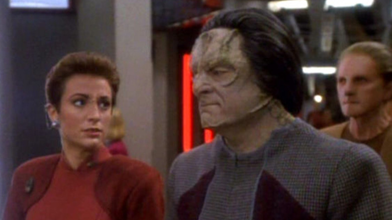 Star Trek: Deep Space Nine's Kira looks worried at Quark