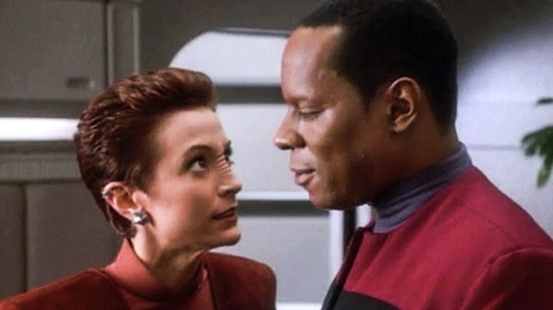 Star Trek Deep Space Nine's Sisko stares at Kira