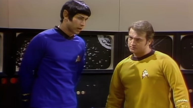 Spock (Chevy Chase) talking to Captain Kirk (John Belushi) on Saturday Night Live