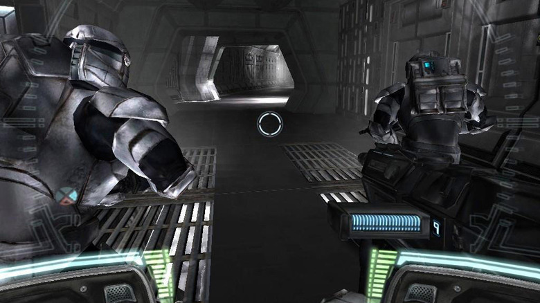 Delta Squad moves down a corridor with blasters drawn in Star Wars: Republic Commando