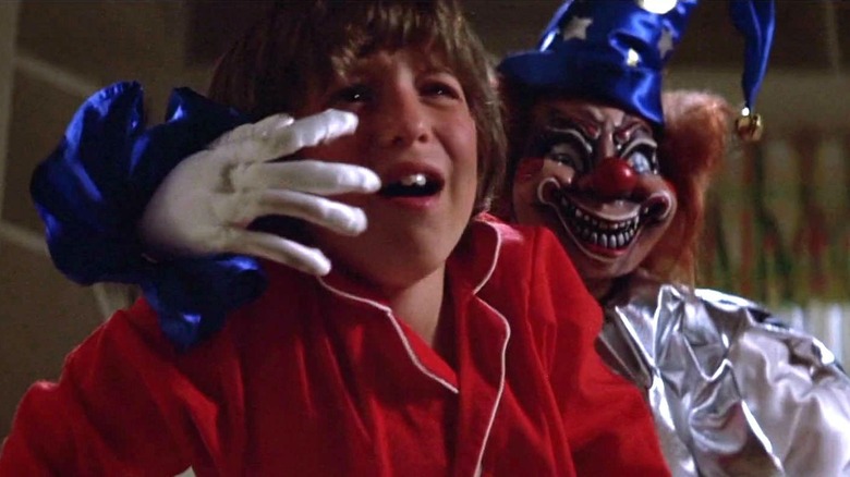 scared child and demonic clown