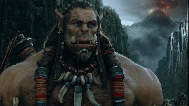 Durotan, father of Thrall, (voiced and mocapped by Toby Kebbell) stands among mountains