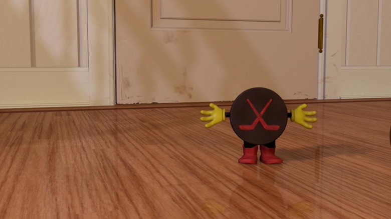 Hockey puck shrugging