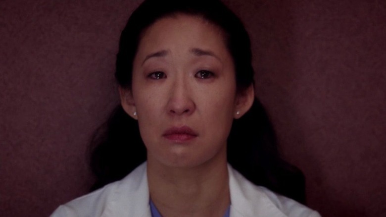 Sandra Oh as Dr. Cristina Yang with tears in her eyes on Grey's Anatomy