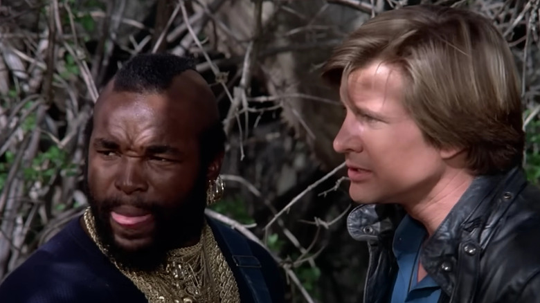 Mr. T as B.A. and Dirk Benedict as Peck prepare to take orders from Hannibal, on The A-Team