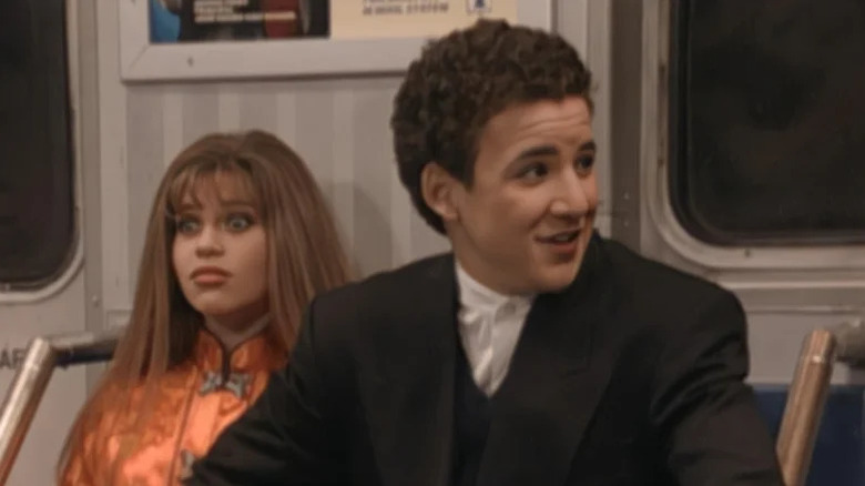 Danielle Fischel as Topanga Lawrence sits afraid next to Ben Savage as Cory Matthews on Boy Meets World.