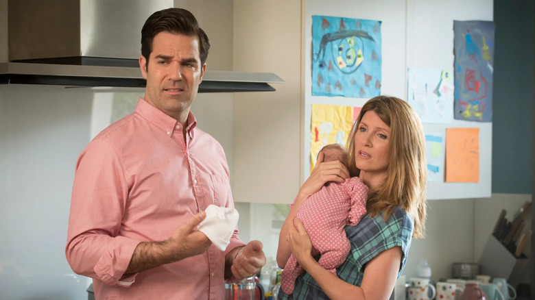Rob Delaney and Sharon Horgan as Rob and Sharon with a baby in Catastrophe
