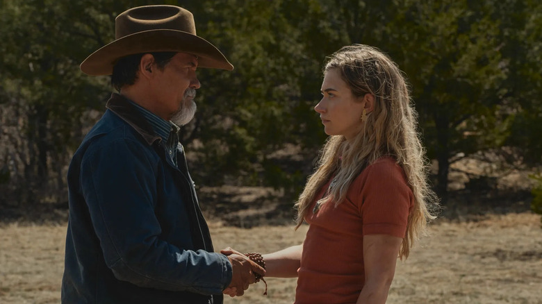 Josh Brolin as Royal shaking the hand of Imogen Poots as Autumn in Outer Range